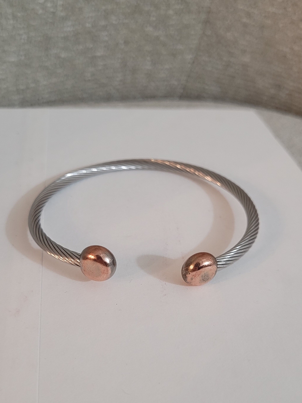 Silver-Tone Cable Cuff Bracelet with Rose Gold Tone End Caps